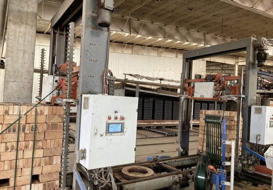 Sistema de embalaje y descarga de ladrillos sin paletas completamente automático para líneas de producción de ladrillos de arcilla