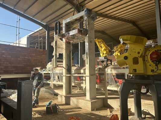 Sistema de embalaje y descarga de ladrillos cocidos sin paletas totalmente automático BBT